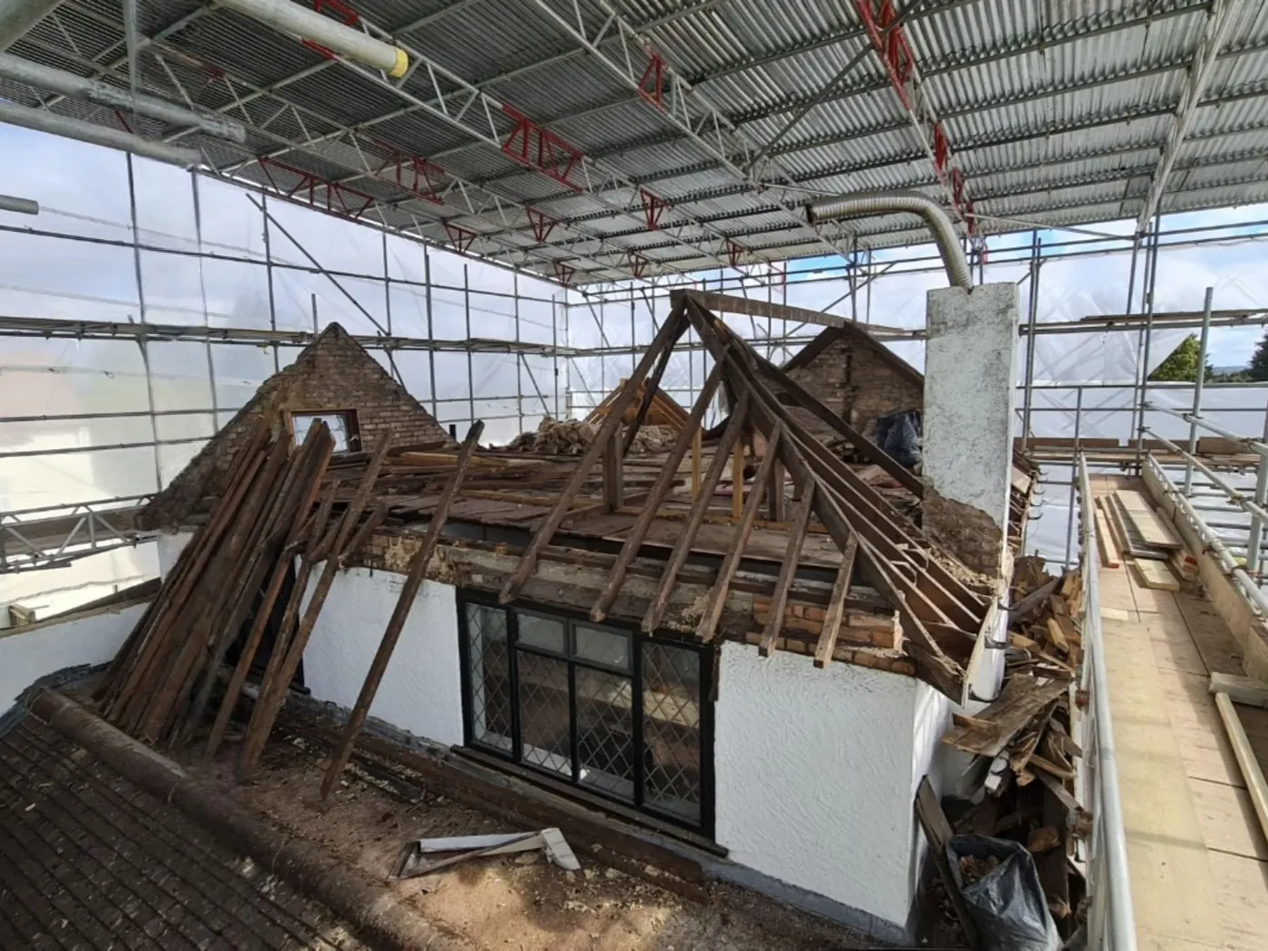 Roof and chimney taken down in a controlled sequence, Lynwood Grove, Orpington — Fellner Construction