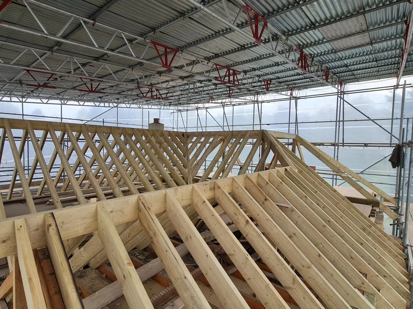New roof structure over house and extension, Lynwood Grove, Orpington — Fellner Construction